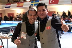 Trân Quyêt Chiên (à gauche) et Nguyên Trân Thanh Tu ont aidé le Vietnam à remporter le championnat du monde. Photo : DBU