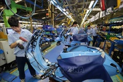 Une chaîne de production de Piaggio Vietnam. Photo: VNA