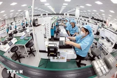 Une chaîne de production de la SARL Khvatec Thai Nguyên (entreprise à capitaux sud-coréens) dans le parc industriel de Yên Binh, ville de Phô Yên. Photo : VNA