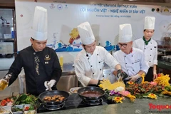 Des artisans culinaires à l'oeuvre. Photo: Toquoc