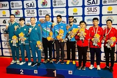 Le tireur Pham Quang Huy et ses coéquipiers ont remporté la médaille de bronze pour l'équipe vietnamienne de tir. Photo : thethao.sggp.org.vn