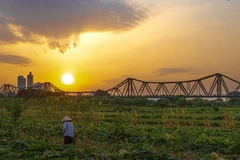 Le pont Long Biên fut le premier pont en acier construit au-dessus du fleuve Rouge. Photo : VNA