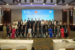 Les délégués participant à la conférence posent pour une photo de groupe. Photo: baoquocte.vn
