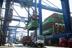 Les exportations vietnamiennes ont atteint environ 470 milliards de dollars en 2025. Photo : VNA
