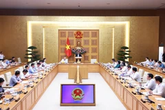 Vue d’ensemble de la conférence faisant le bilan d’un mois de fonctionnement de ce système, à Hanoi, le 28 juillet. Photo : VNA