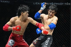 Le champion du monde Nguyên Trân Duy Nhât défendra son titre de muay thaï aux Jeux mondiaux 2025, qui se dérouleront du 7 au 17 août en Chine. Photo dantri.vn