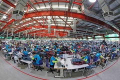 Le ministère de l'Intérieur a proposé la création d'une plateforme nationale centralisée pour les contrats de travail électroniques. Photo: VNA