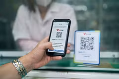 En 2025, la valeur des paiements sans numéraire a atteint environ 28 fois le PIB. Photo : VietnamPlus
