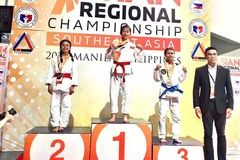 Triêu Thi Thuy, 17 ans, a remporté l’or pour le Vietnam dans la catégorie féminine Newaza Gi (44 kg). Photo : Comité d’organisation