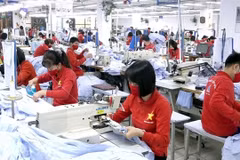 Malgré une forte demande intérieure, de nombreux entreprises du textile et de l'habillement peinent à étendre leur présence et à revendiquer une plus grande part du marché local. Photo : moit.gov.vn