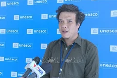 Dinh Duc Hoàng, directeur général adjoint du Centre d’information de l’UNESCO (UNET) au micro de la VNA. Photo : VNA