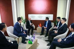 Rencontre entre le Premier ministre Pham Minh Chinh et le président de Cisco Asie-Pacifique, Japon et Grande Chine (APJC), Dave West, à Tianjin, le 25 juin. Photo : VNA