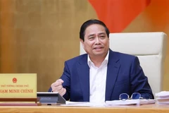 Le Premier ministre Pham Minh Chinh s’exprime lors de la réunion thématique de mai du gouvernement, à Hanoi, le 22 mai. Photo : VNA