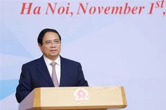 Le Premier ministre Pham Minh Chinh s’exprimant lors de la conférence, à Hanoi, le 1er novembre. Photo : VNA