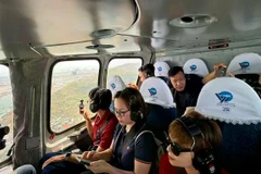 Un vol en hélicoptère au-dessus de Hô Chi Minh-Ville est une expérience à couper le souffle qui offre une vue imprenable sur la mégapole du Sud. Photo: sggp.org.vn