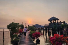 Coucher de soleil sur le fleuve Tiên, l'un des bras du Mékong, vu depuis la zone touristique de Côn En. Photo: tuoitre.vn