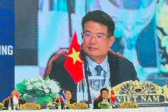 Le procureur général du Parquet populaire suprême du Vietnam, Nguyên Huy Tiên lors de la cérémonie de signature de la Déclaration de Sanur Bali. Photo : VNA