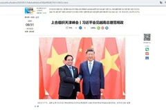 Capture d’écran d’un article de l’agence de presse Xinhua sur la rencontre entre le secrétaire général et président chinois Xi Jinping et le Premier ministre vietnamien Pham Minh Chinh, à Tianjin, le 31 août. Photo : VNA