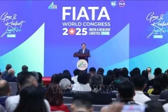 Le Premier ministre Pham Minh Chinh s’exprime lors du Congrès mondial 2025 de la Fédération internationale des associations de transitaires et assimilés (FIATA), à Hanoi, le 8 octobre. Photo : VNA