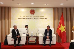 La province de Binh Duong et la société japonaise Tokyu Corporation discutant de la coopération pour le développement des infrastructures. Photo: VNA