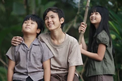 Scène du film « Toi thây hoa vang trên co xanh » (Je vois des fleurs jaunes sur l’herbe verte) du réalisateur Victor Vu. Photo: NDEL