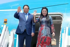 Le Premier ministre Pham Minh Chinh et son épouse. Photo : VNA