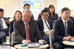 Le vice-Premier ministre permanent Nguyên Hoa Binh lors du Dialogue sur la finance et la technologie Vietnam-États-Unis. Photo : VNA