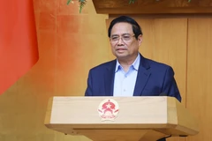 Le Premier ministre Pham Minh Chinh lors de la réunion ordinaire du gouvernement de février. Photo: VNA