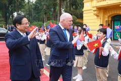 Le Premier ministre Pham Minh Chinh et son homologue néo-zélandais Christopher Luxon (à droite). Photo: VNA