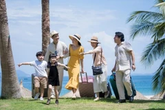 Les familles vietnamiennes voyagent pour passer du temps ensemble. Photo d'illustration: vietnambooking.com
