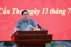 Le Premier ministre Pham Minh Chinh s’exprime lors de la conférence, à Cân Tho, le 13 juillet. Photo : VNA