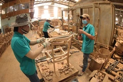 Les meubles en bois constituent un produit d’exportation clé du Vietnam vers les principaux marchés, notamment les États-Unis, le Japon, la République de Corée et l’Inde. Photo : VNA
