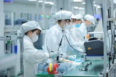 Les produits électroniques, ordinateurs et composants, sont en tête des exportations. Photo : VNA