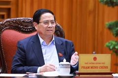 Le Premier ministre Pham Minh Chinh s’exprime lors de la réunion, à Hanoi, le 20 mai. Photo: VNA