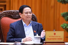 Le Premier ministre Pham Minh Chinh s’exprime lors de la réunion, à Hanoi, le 20 mai. Photo: VNA
