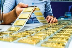 La BEV délivrera des licences d’importation d’or à des entreprises et banques commerciales et fixera un quota annuel. Photo : VNA