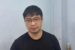 Pho Duc Nam, connu sous le nom de "M. Pips", arrêté par la police. Photo: VNA