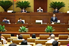 Vue d’ensemble de la séance de questions-réponses, dans le cadre de la 9e session de la 15e législature. Photo : VNA
