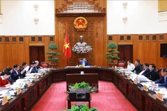 Le Premier ministre Pham Minh Chinh (centre) présidant la conférence du Comité du Parti du gouvernement, à Hanoi, le 5 mars. Photo: VNA