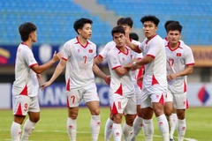 L’équipe vietnamienne des moins de 23 ans célèbre sa victoire contre le Laos, lors du Championnat de l’ASEAN de football U23 2025, le 19 juillet. Photo : vietbao.vn
