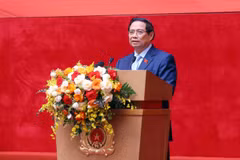 Le Premier ministre Pham Minh Chinh s’adresse à la conférence, à Hanoi, le 12 novembre. Photo : VNA