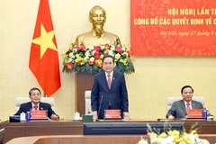 Le président de l’Assemblée nationale, Trân Thanh Mân (au centre), prend la parole lors de la conférence, à Hanoi, le 27 juin. Photo : VNA 