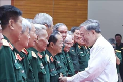 Le secrétaire général du Parti, Tô Lâm, avec les délégués, à Hanoi, le 31 juillet. Photo: VNA