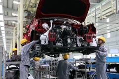 La Resolution N°68 du Poliburo du Parti vise à créer un environnement propice au développement du secteur privé. Photo : VNA