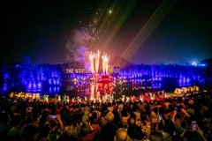 Le spectacle vivant "Tinh hoa Bac Bô" (La quintessence du Tonkin) présente les pratiques rizicoles du delta du fleuve Rouge, berceau de la civilisation de la riziculture irriguée du Vietnam. Photo: SGGP