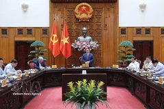Le Premier ministre Pham Minh Chinh préside la réunion de la permanence du gouvernement sur la préparation de la mise en œuvre du projet de réserve nationale de pétrole brut à Nghi Son.
