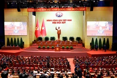 Vue panoramique de la séance de clôture du 14e Congrès national du Parti communiste du Vietnam. Photo: VNA