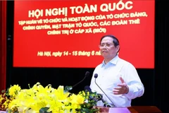 Le Premier ministre Pham Minh Chinh s'exprime lors de la conférence nationale de formation sur l’organisation et le fonctionnement des organisations du Parti, des administrations locales, du comité du Front de la Patrie du Vietnam et des organisations politiques de masse au niveau communal. Photo: VNA