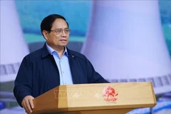 Le Premier ministre Pham Minh Chinh, chef du Comité de pilotage pour la construction de la centrale nucléaire, préside la troisième réunion du Comité, à Hanoi, le 22 octobre. Photo: VNA