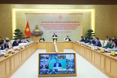 Vue d'ensemble de la conférence nationale, à Hanoi, le 30 décembre. Photo: VNA